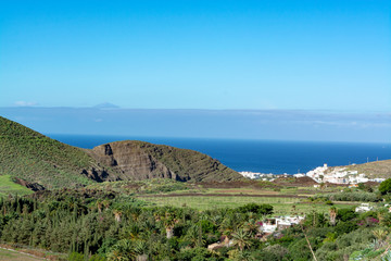 Fertile valley with mango and oranges fruit plantations, vineyards and avocados orchards near Agaete, Gran Canaria, Canary islands, Spain