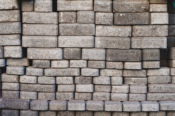 background of stacked paving slabs with a rough gray surface