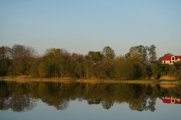 Obraz premium Reflection of Nesvizh Castle in the pond in autumn. Nyasvizh, Nieśwież, Nesvizh,&nbsp;Niasvizh, Nesvyzhius, Nieświeżh, in Minsk Region, Belarus. Site of residential castle of the Radziwill family. 
