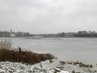 Naklejka premium winter landscape with river and sky