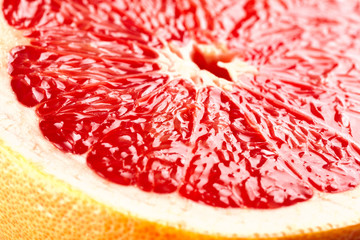 cut grapefruit on white background