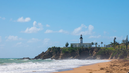 Fototapeta na wymiar Punta Tuna Lighthouse, Puerto Rico, Maunabo, Puerto Rico from the beach view.