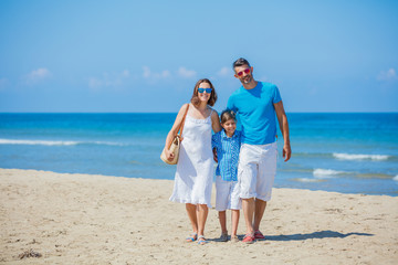 Happy family having fun in the summer leisure