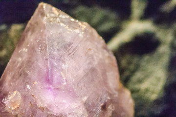Purple Amethyst rock specimen from mining and quarrying industries. Amethyst is a violet variety of quartz often used in jewelry.