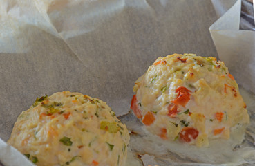 Chicken meatballs with vegetables - preparation for baked in the oven. Ingredients on the counter Healthy protein cutlets, minced cutlets. Proper, healthy food concept.