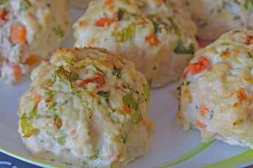 Chicken meatballs with vegetables - preparation for baked in the oven. Ingredients on the counter Healthy protein cutlets, minced cutlets. Proper, healthy food concept.