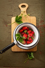 Fresh summer berry in colander