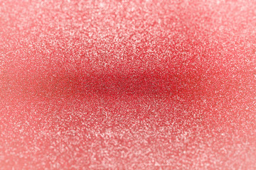 Red maroon glitter light background, blurry background and foreground