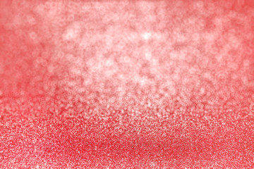 Abstract light glitter bokeh background in red maroon color
