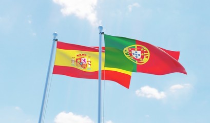 Portugal and Spain, two flags waving against blue sky. 3d image