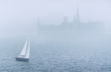 Boat in the sea in mist