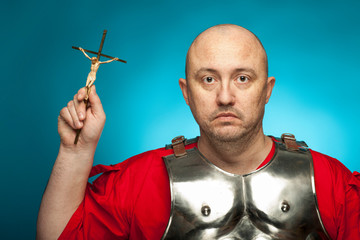 A roman soldier with a crucifix
