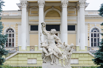 Naklejka premium Statue of Laocoon and his Sons, the Laocoon Group, monumental marble sculpture. Statue in municipal park of Odessa near Archaeological Museum