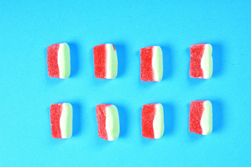 group of jelly candies watermelon on blue background