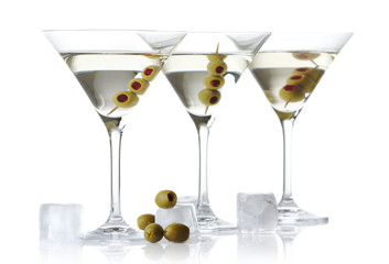 Cool classic dry martini with olives and ice cubes isolated on white