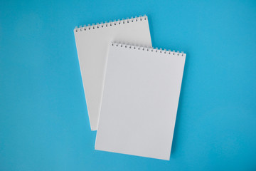 school notebook on blue background