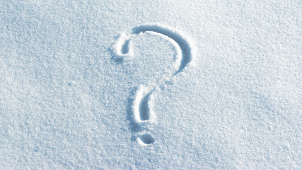 Question mark in the light blue bright snow