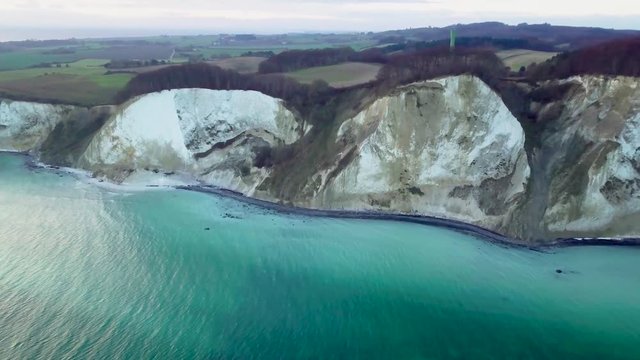 White Mons Klint Chalk Cliffs and Turquoise Blue Sea From Drone