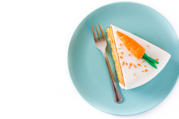 Sweet carrot cake slice isolated on white background. Top view. Copyspace