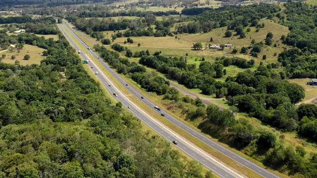 Hyperlapse of a busy rural highway from drone. Shot on a Mavic 2 Pro in Australia. Traffic drives on the left hand side.