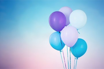 Colorful balloons with happy celebration party background