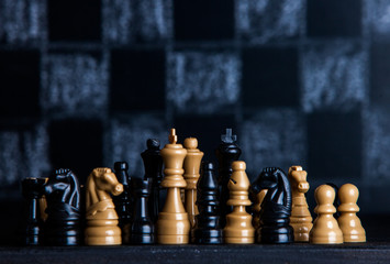 Chess board with chess pieces. Chess on the dark background. Business success concept. Strategy....