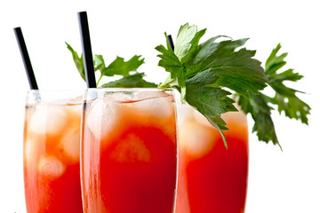 Close up of bloody mary with ice cubes isolated on white background