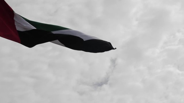 Closeup of the UAE (United Arab Emirates) flag blowing in the wind.