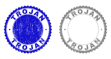 Grunge TROJAN watermarks isolated on a white background. Rosette seals with grunge texture in blue and gray colors. Vector rubber stamp imitation of TROJAN caption inside round rosette.