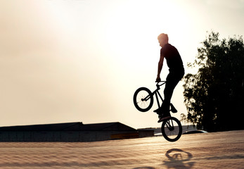 teenager on a bicycle
