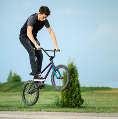 teenager on a bicycle