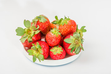 Strawberries on white