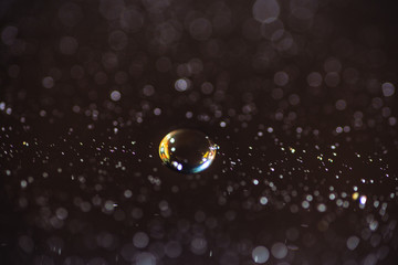 Bubbles on water macro photo