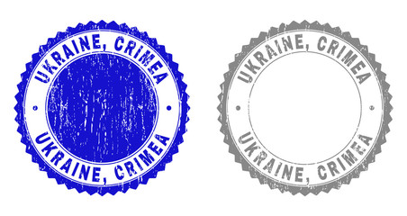 Grunge UKRAINE, CRIMEA stamp seals isolated on a white background. Rosette seals with grunge texture in blue and grey colors. Vector rubber watermark of UKRAINE, CRIMEA title inside round rosette.