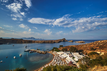 view of the beach and the bay of Lindos in Rhodes.