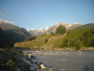 Fototapeta na wymiar Fast shallow river in the Caucasus mountains. Georgia.