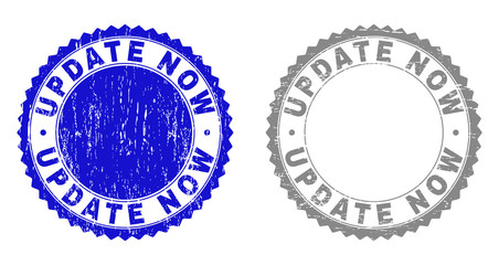 Fototapeta premium Grunge UPDATE NOW stamp seals isolated on a white background. Rosette seals with distress texture in blue and gray colors. Vector rubber stamp imitation of UPDATE NOW caption inside round rosette.