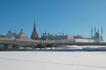 River under snow cover, bridge and Kremlin. Kazan, Russia
