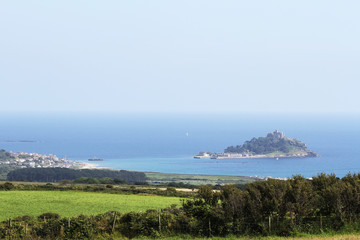 Distant view of St. Michaels Mount at high tide. Marazion, Cornwall, UK