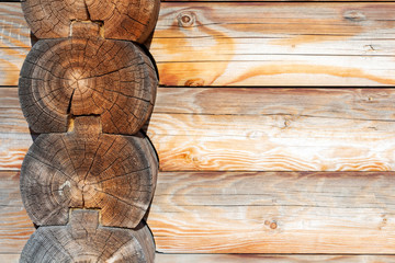 brown rustic wooden texture background. facade of a log house, copy space.