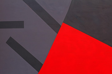 Colorful (red and grey) painted wall as background or texture