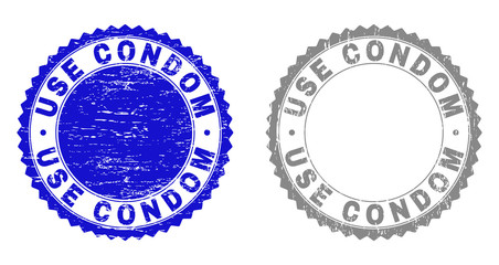 Grunge USE CONDOM stamp seals isolated on a white background. Rosette seals with distress texture in blue and grey colors. Vector rubber stamp imprint of USE CONDOM caption inside round rosette.
