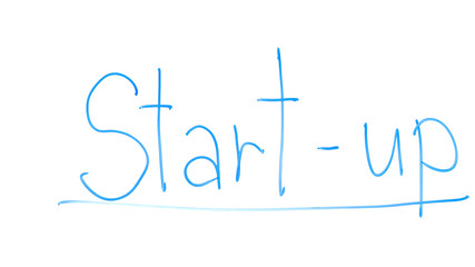Start-up word written on glass, beginning of new business, development strategy
