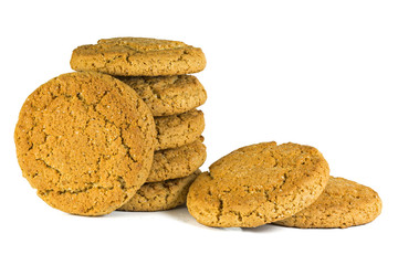 Stack of cookies against a white background. Oat cookies closeup on white background. A stack of sweet biscuits oat cookies closeup on white background