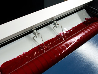Press printing - Offset machine. Printing technique where the inked image is transferred from a...