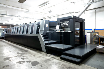 Press printing - Offset machine. Printing technique where the inked image is transferred from a plate to a rubber blanket, then to the printing surface. - obrazy, fototapety, plakaty