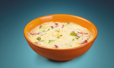 Bowl of delicious vegetables soup on  table