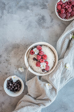 Rice Semilina Breakfast Bowl with Raspberries and Blueberries