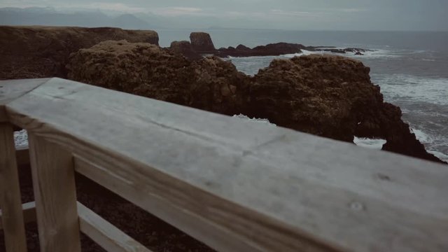 Handheld shot of the Arnarstapi Arch in Iceland,