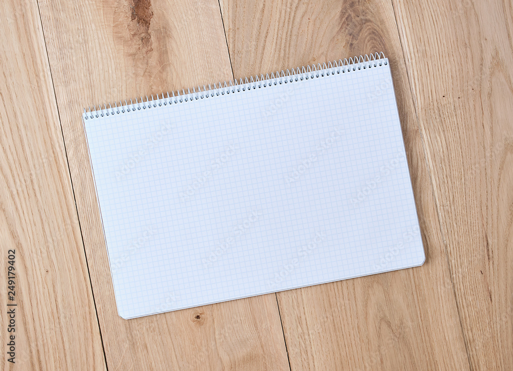 Poster open notebook with a cell with empty sheets